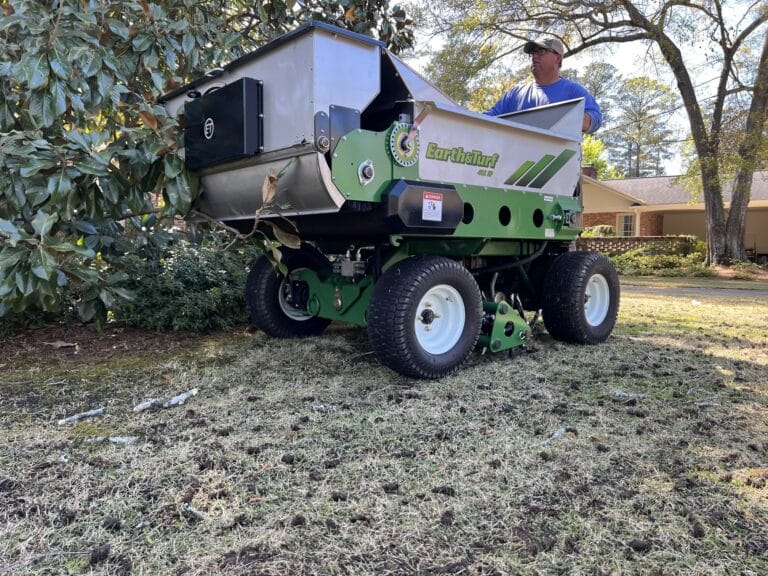 Consider your overhead and labor costs when factoring pricing for a top dressing job