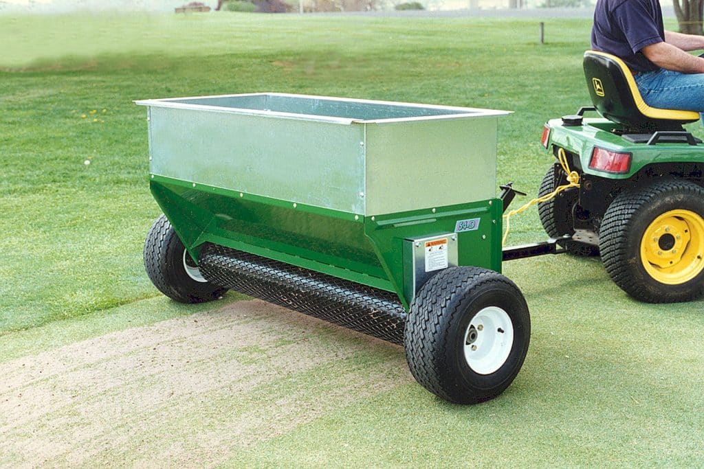 large tow behind open topdresser earth and turf products
