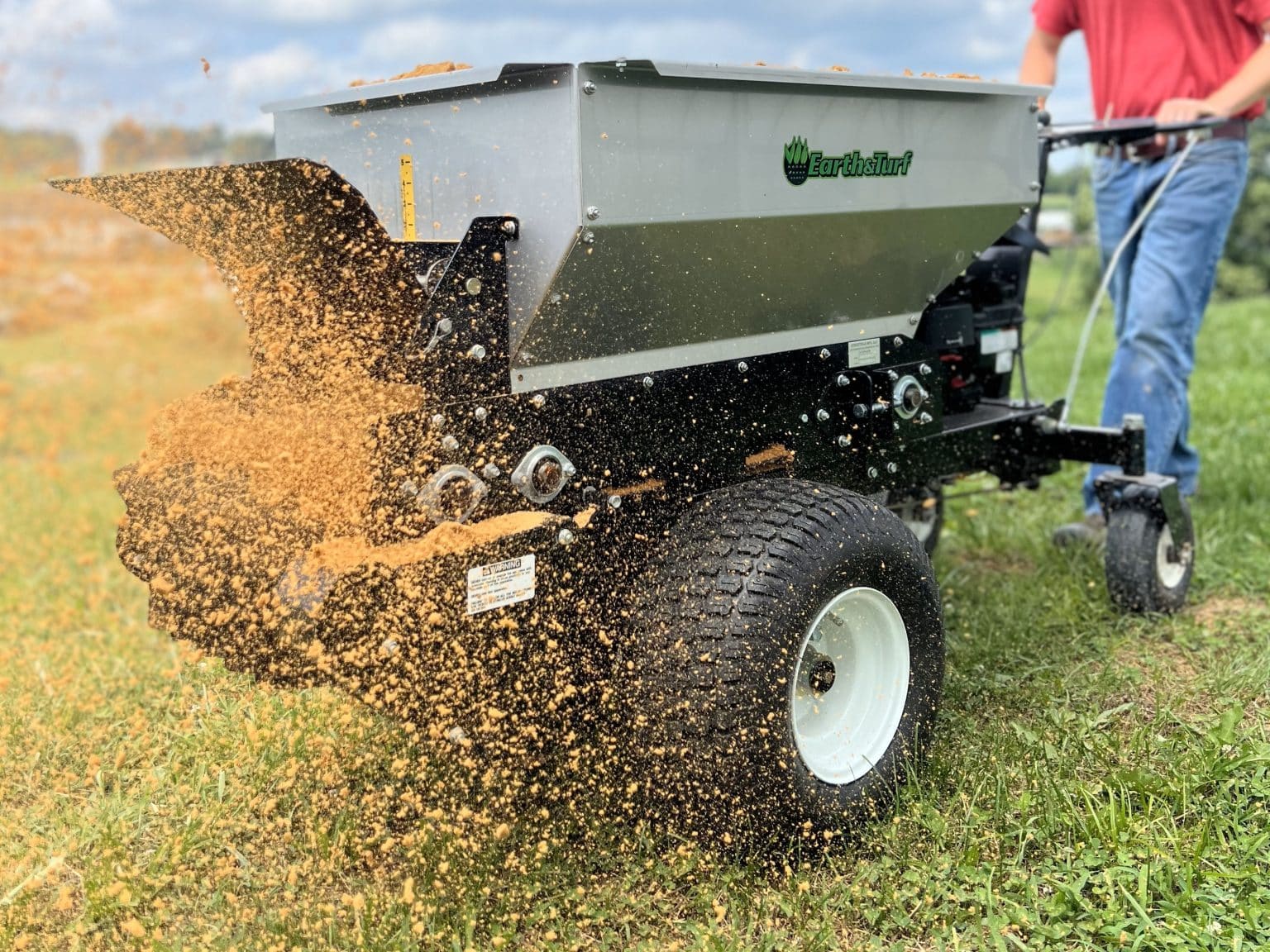 Spreaders by application earth turf