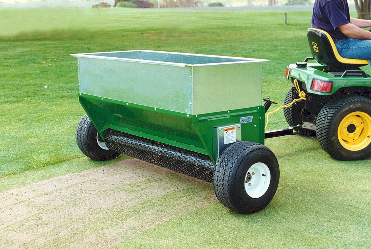 Pull Behind Drop Spreader | Largest Topdresser Model